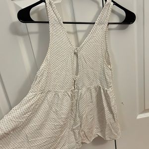 Black and white sleeveless blouse